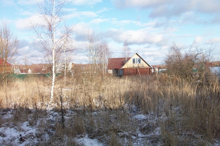 Земельный участок в деревне Ольгино 