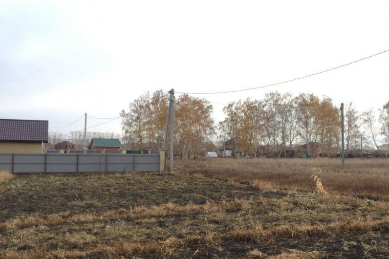 Земельный участок в селе Усть-Заостровке